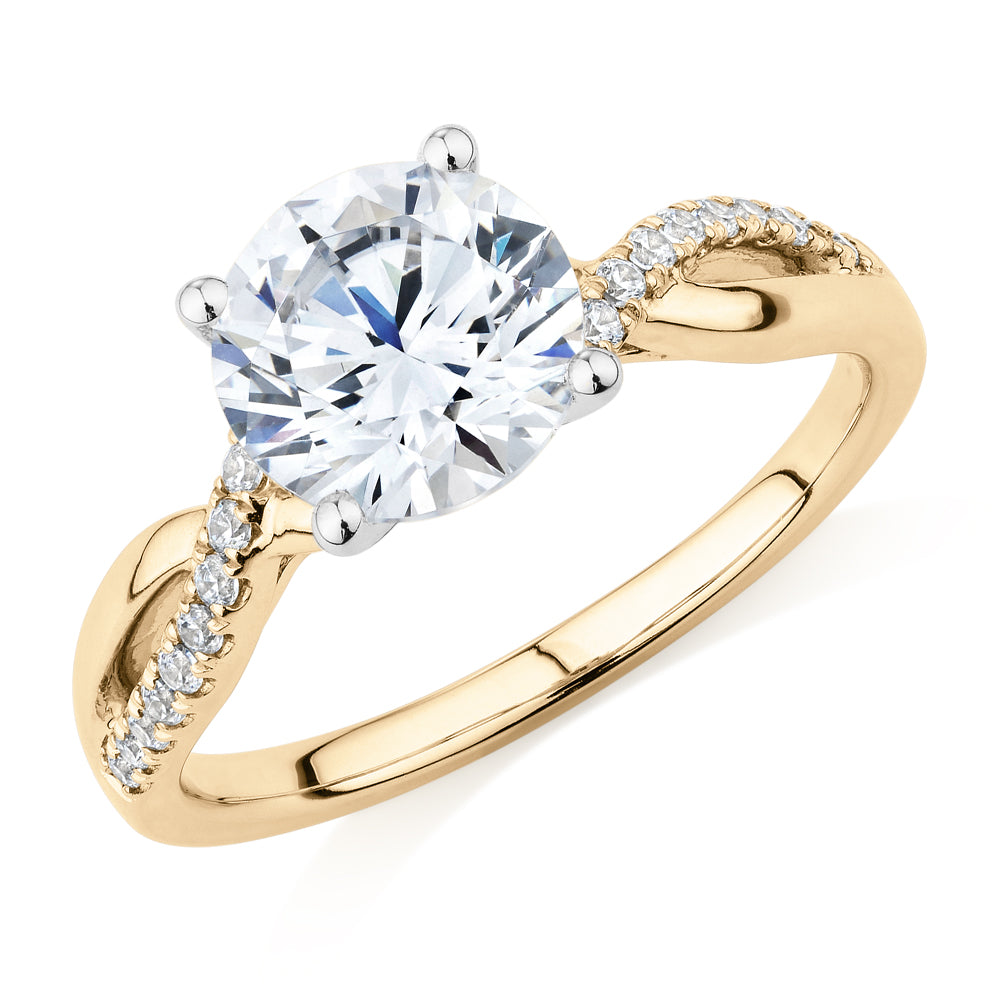 Round Brilliant shouldered engagement ring with 2.17 carats* of diamond simulants in 14 carat yellow and white gold
