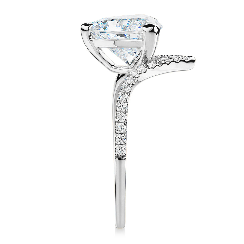 Trilliant and Round Brilliant shouldered engagement ring with 2.52 carats* of diamond simulants in 14 carat white gold
