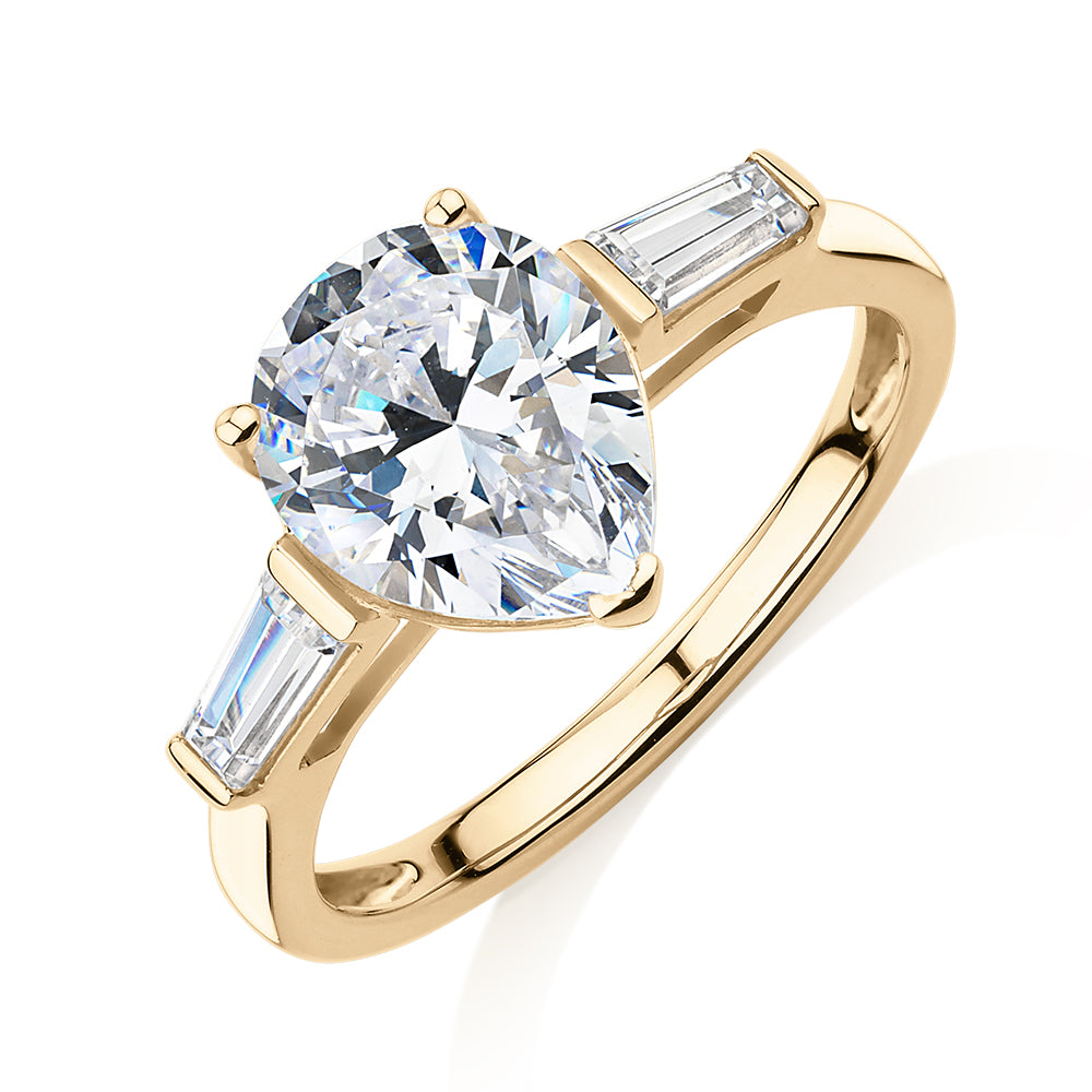 Pear shouldered engagement ring with 2.88 carats* of diamond simulants in 10 carat yellow gold