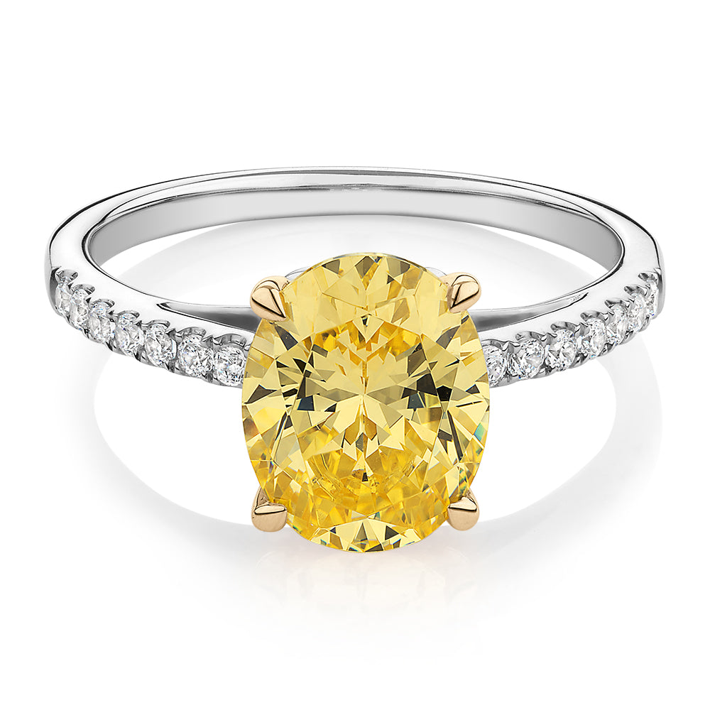 Oval and Round Brilliant shouldered engagement ring with 2.68 carats* of diamond simulants in 10 carat white and yellow gold