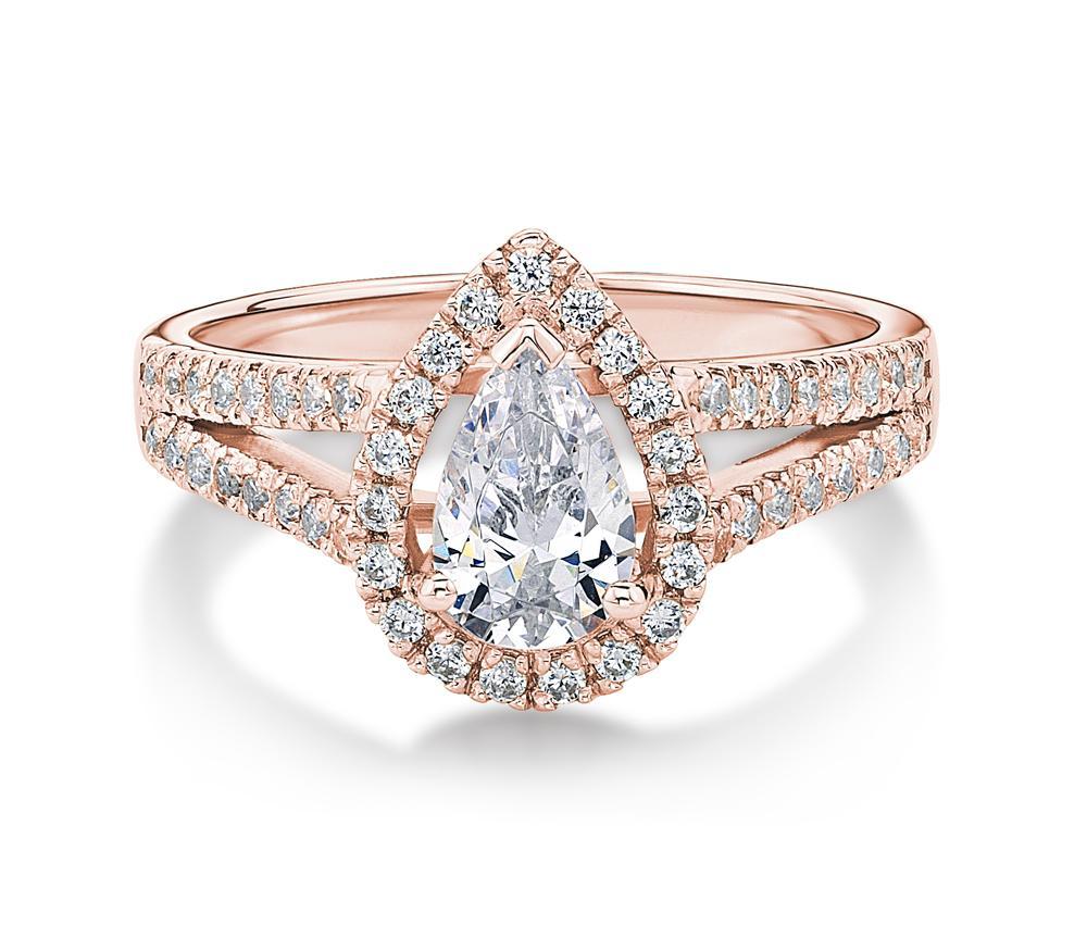 Pear and Round Brilliant halo engagement ring with 1.16 carats* of diamond simulants in 14 carat rose gold