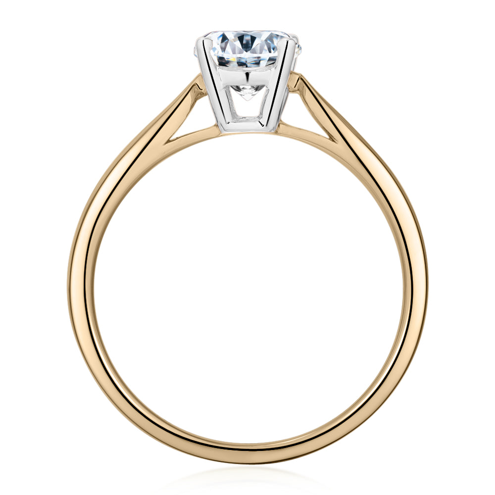 Round Brilliant solitaire engagement ring with 0.75 carat* diamond simulant in 14 carat yellow and white gold