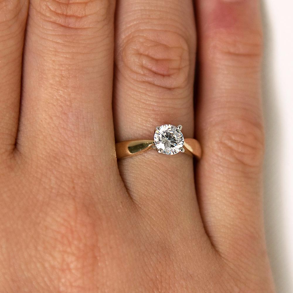 Round Brilliant solitaire engagement ring with 1 carat* diamond simulant in 14 carat yellow and white gold