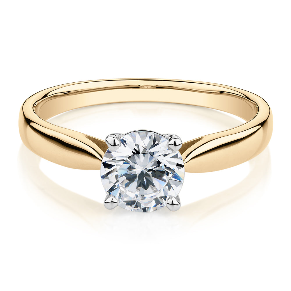 Round Brilliant solitaire engagement ring with 1 carat* diamond simulant in 14 carat yellow and white gold