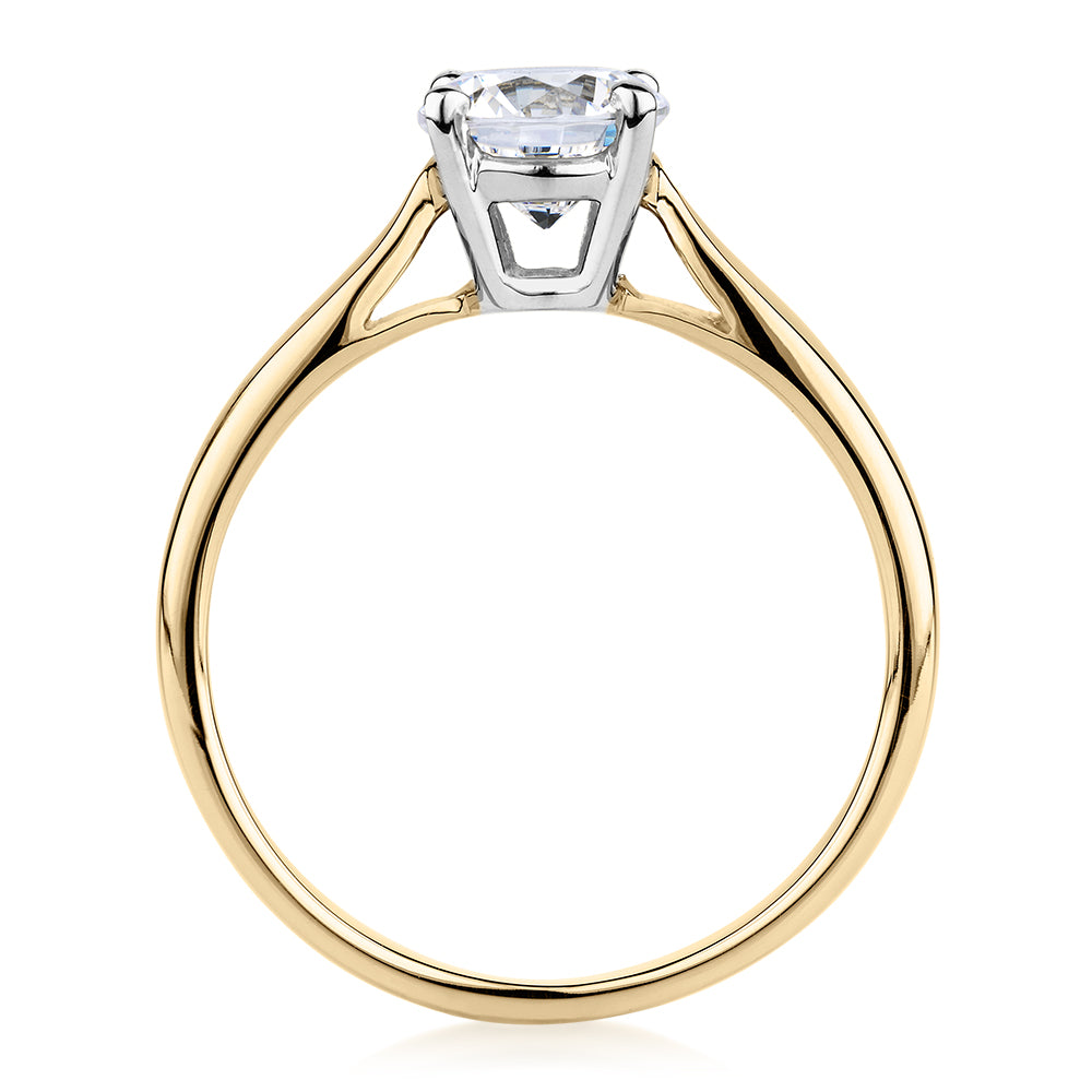 Round Brilliant solitaire engagement ring with 1 carat* diamond simulant in 14 carat yellow and white gold