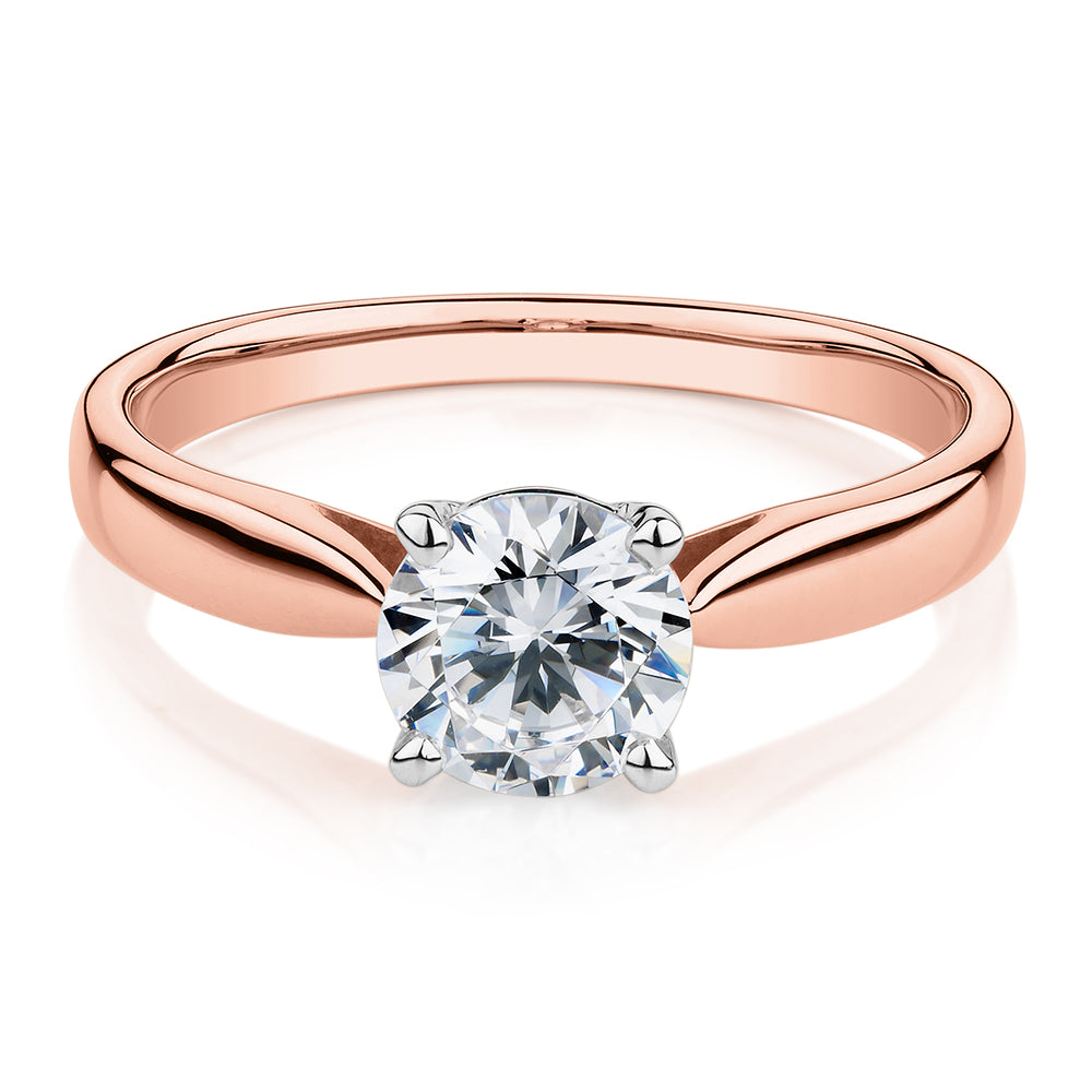 Round Brilliant solitaire engagement ring with 1 carat* diamond simulant in 14 carat rose and white gold