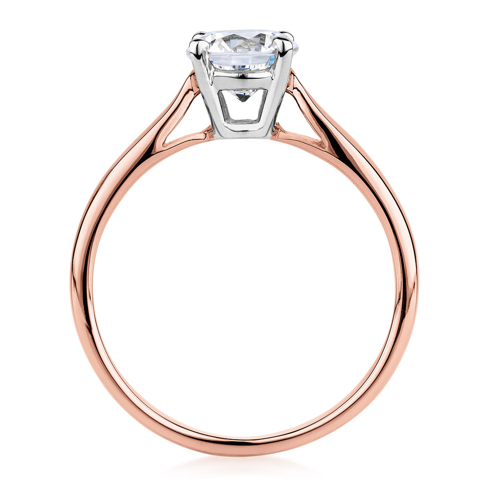 Round Brilliant solitaire engagement ring with 1 carat* diamond simulant in 14 carat rose and white gold