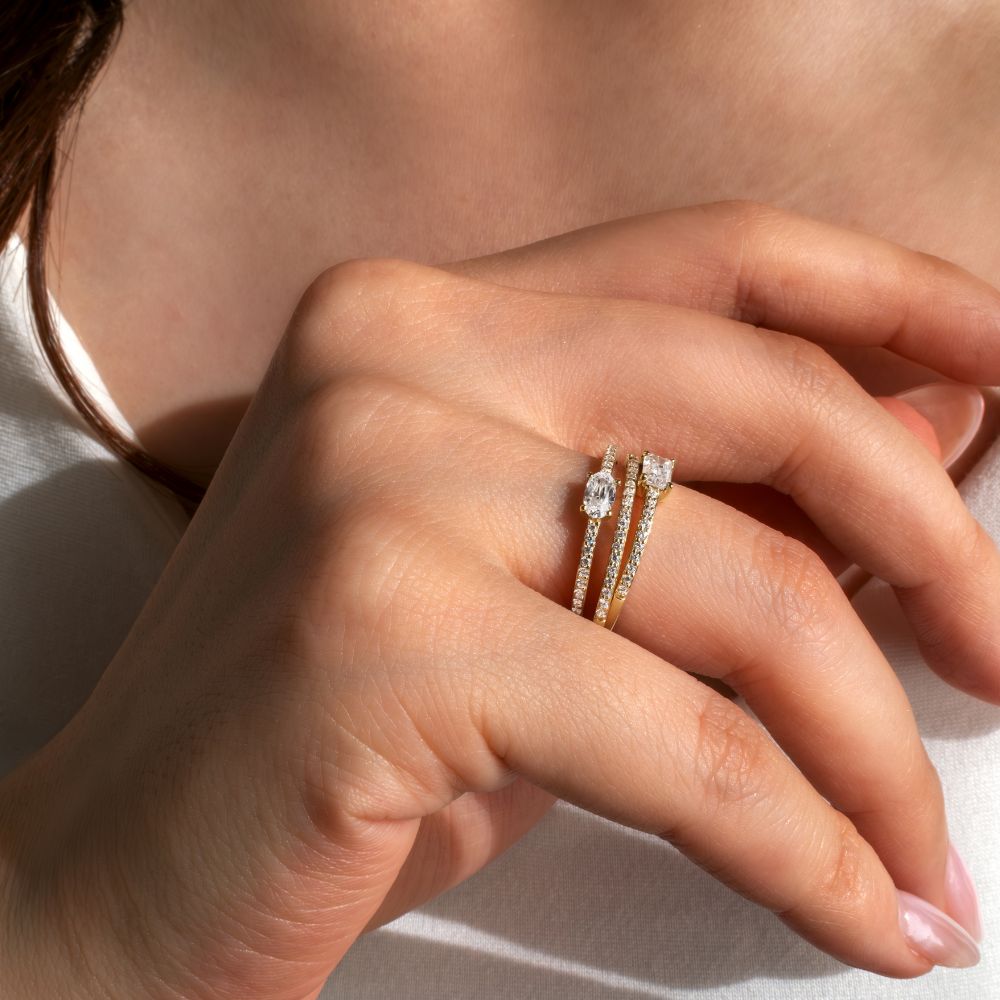 Dress ring with 0.39 carats* of diamond simulants in 10 carat yellow gold