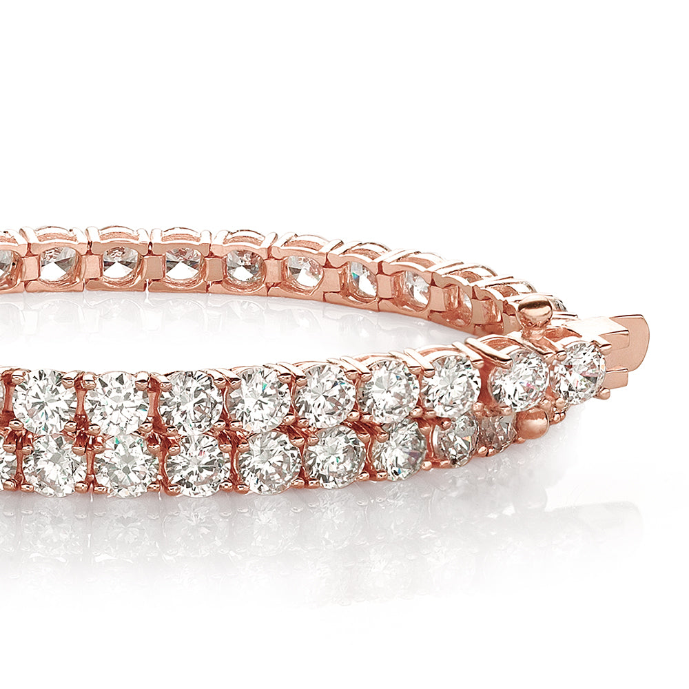 Round Brilliant tennis bracelet with 6.27 carats* of diamond simulants in 10 carat rose gold