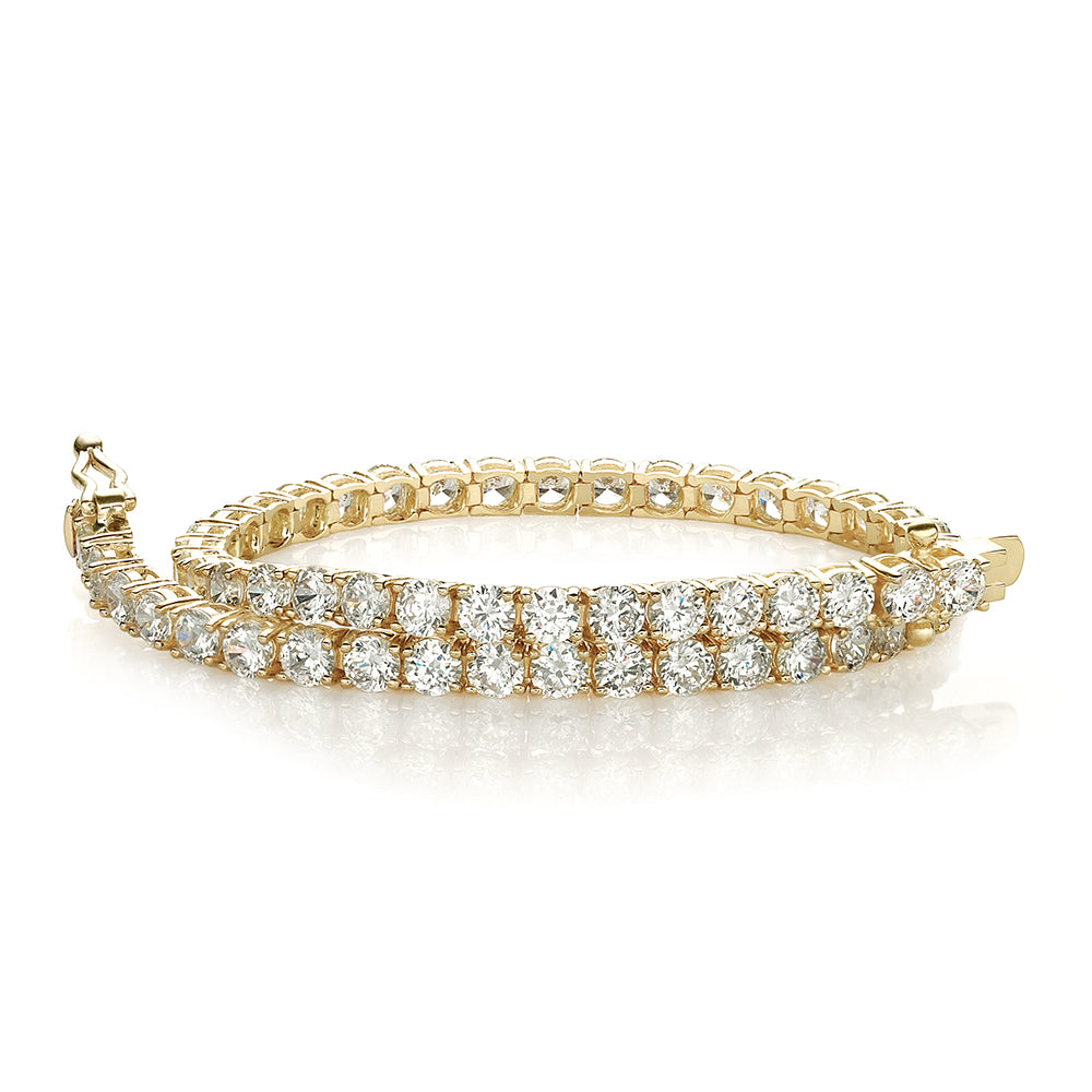 Round Brilliant tennis bracelet with 6.27 carats* of diamond simulants in 10 carat yellow gold