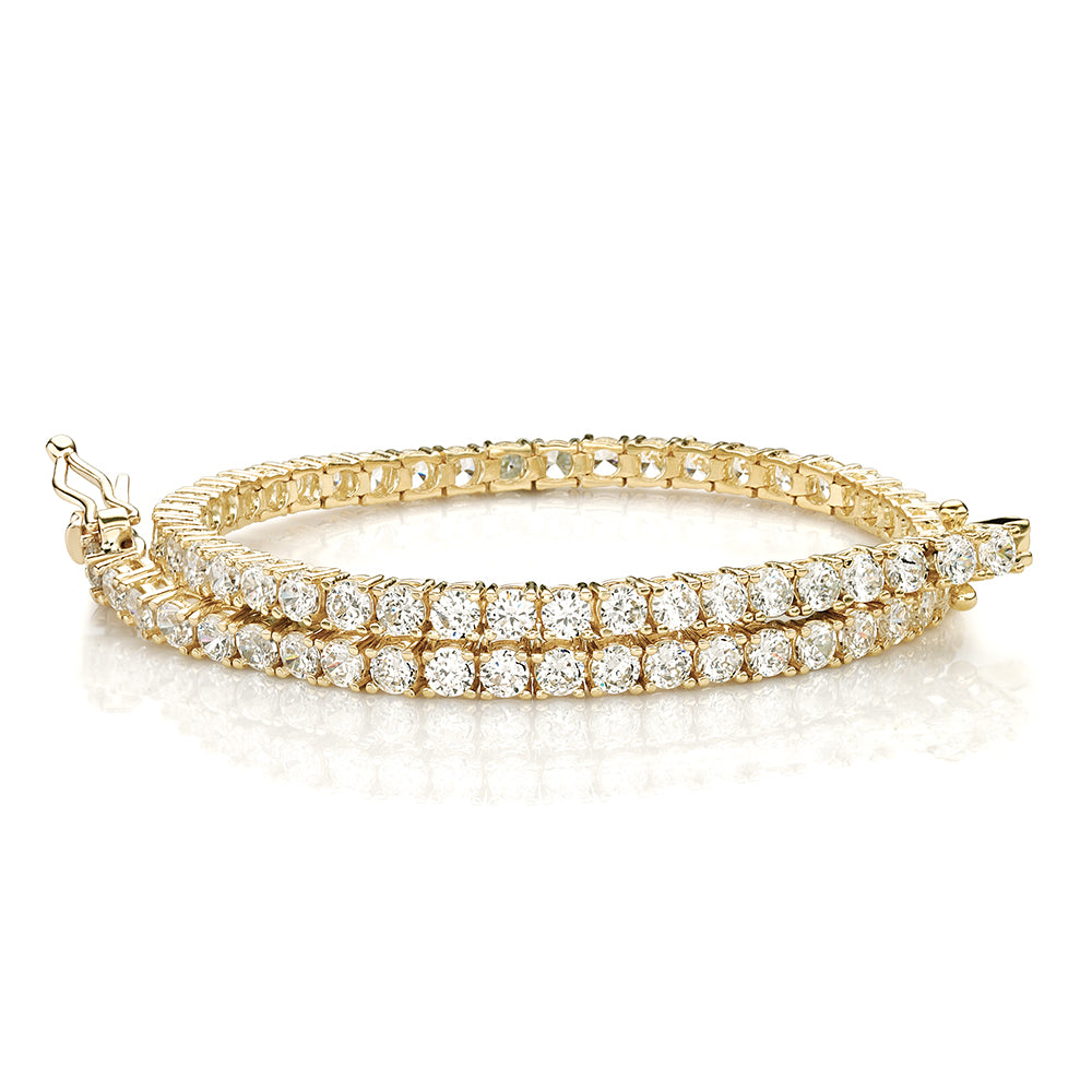 Round Brilliant tennis bracelet with 4.02 carats* of diamond simulants in 10 carat yellow gold