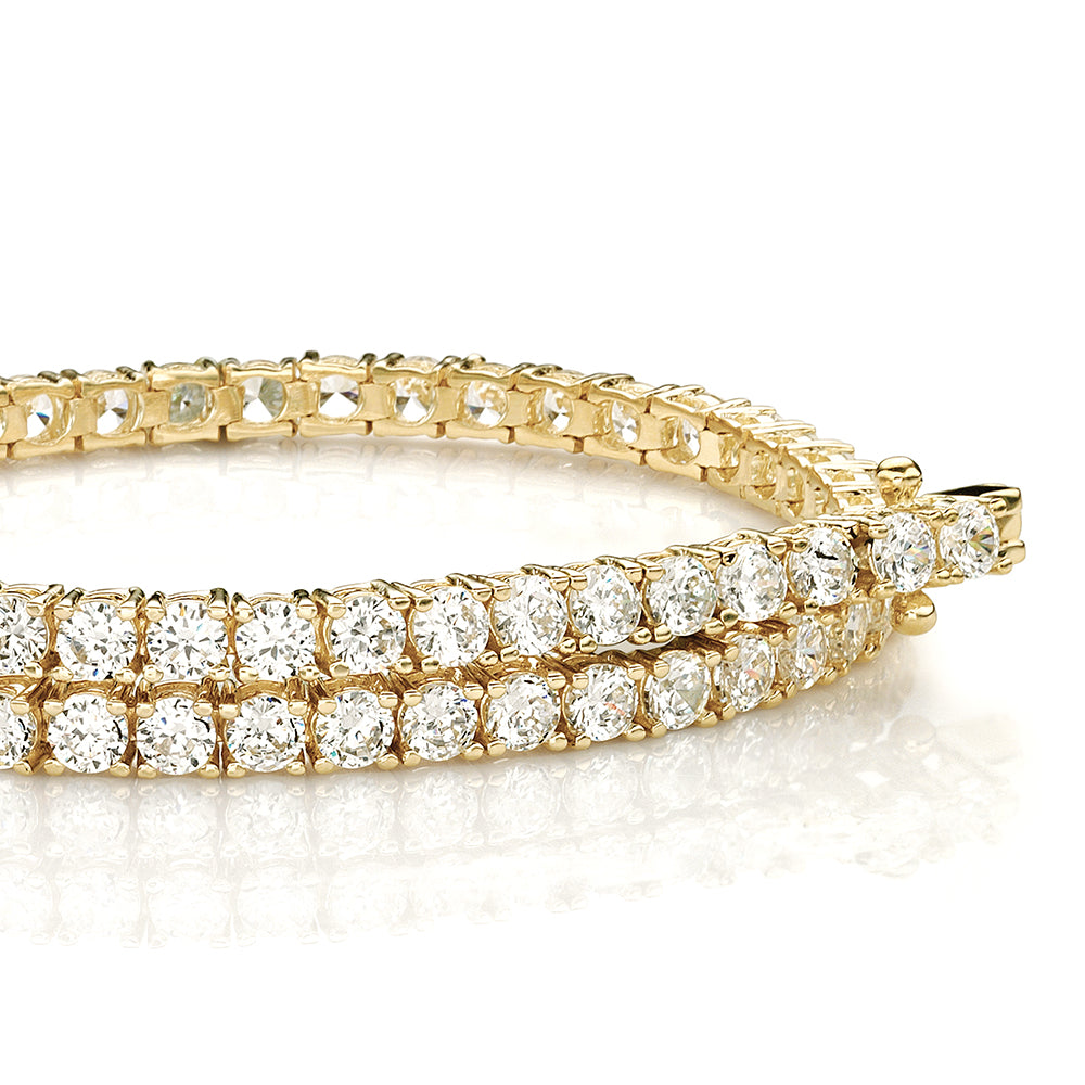 Round Brilliant tennis bracelet with 4.02 carats* of diamond simulants in 10 carat yellow gold