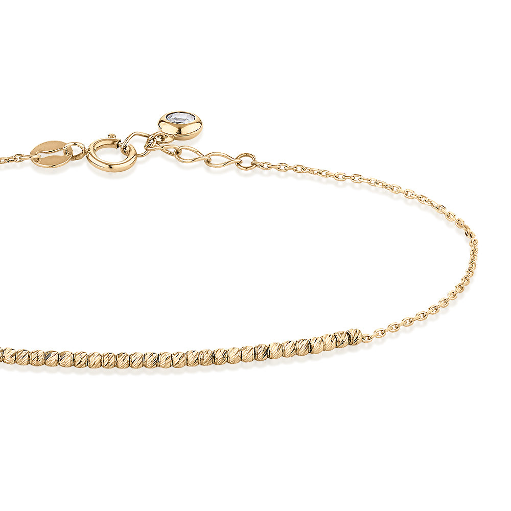 Bracelet with diamond simulant in 10 carat yellow gold