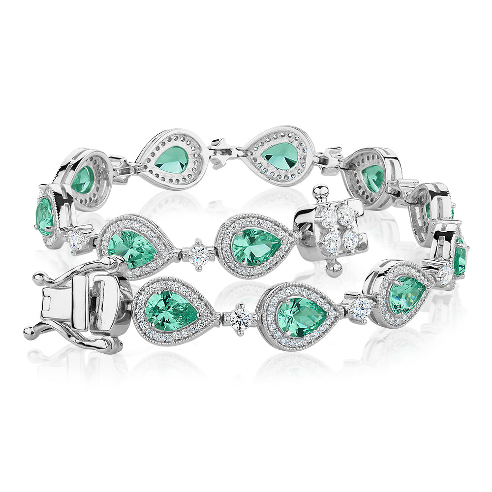 Pear and Round Brilliant tennis bracelet with ocean green simulants and 1.50 carats* of diamond simulants in sterling silver