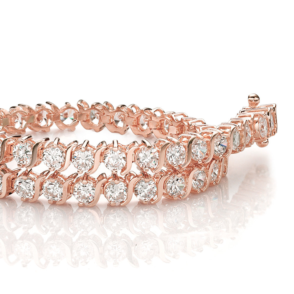 Round Brilliant tennis bracelet with 5.28 carats* of diamond simulants in 10 carat rose gold