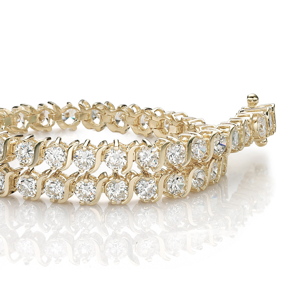 Round Brilliant tennis bracelet with 5.28 carats* of diamond simulants in 10 carat yellow gold