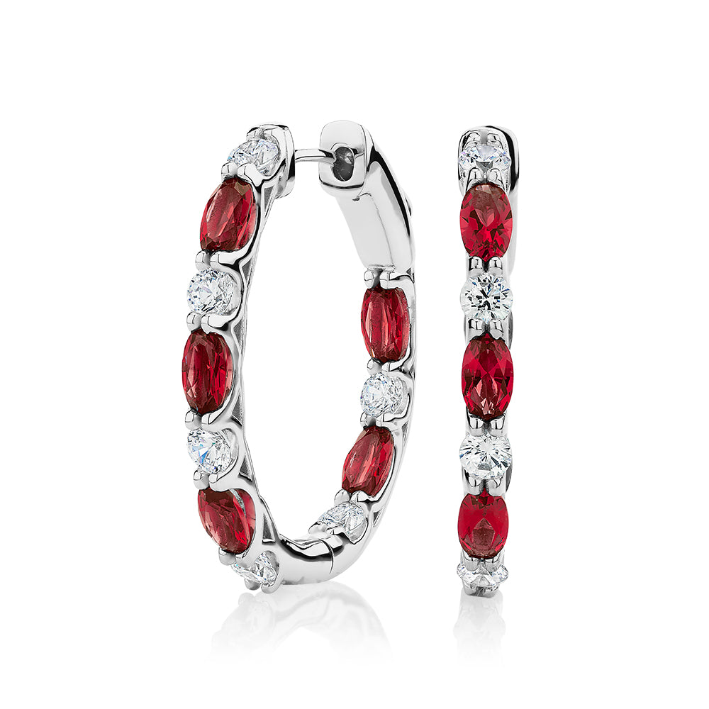 Round Brilliant and Oval hoop earrings with ruby simulants and 1.32 carats* of diamond simulants