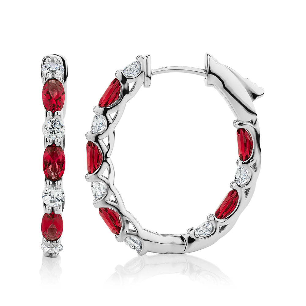 Round Brilliant and Oval hoop earrings with ruby simulants and 1.32 carats* of diamond simulants