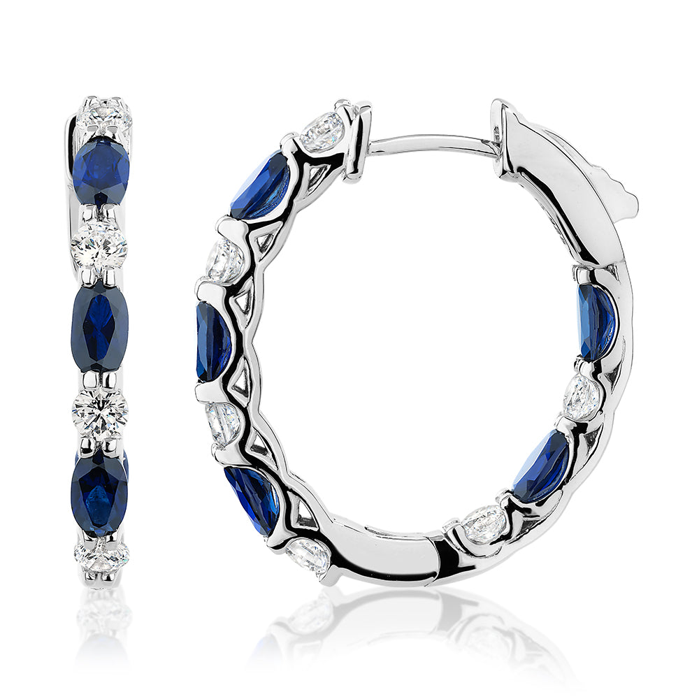 Round Brilliant and Oval hoop earrings with sapphire simulants and 1.32 carats* of diamond simulants