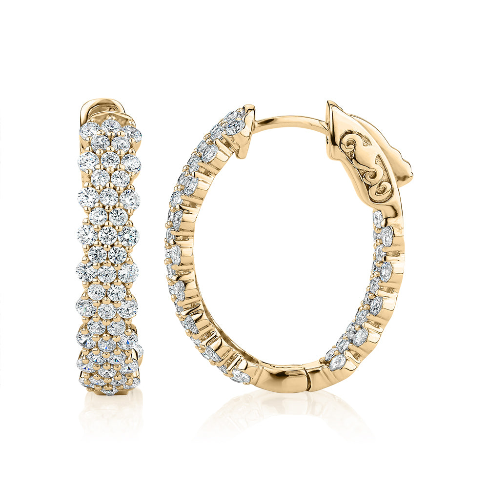 Round Brilliant Signature Simulant inside-out hoop earrings in 18 carat yellow gold vermeil