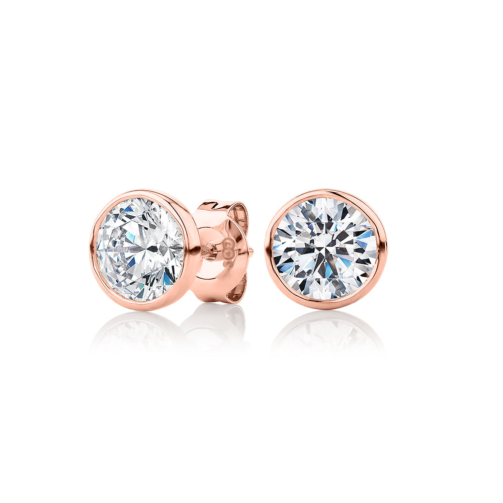 Round Brilliant stud earrings with 2 carats* of diamond simulants in 10 carat rose gold
