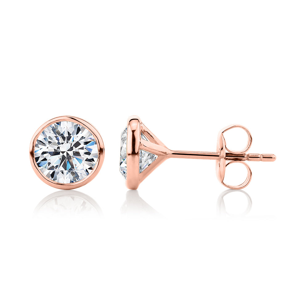 Round Brilliant stud earrings with 2 carats* of diamond simulants in 10 carat rose gold