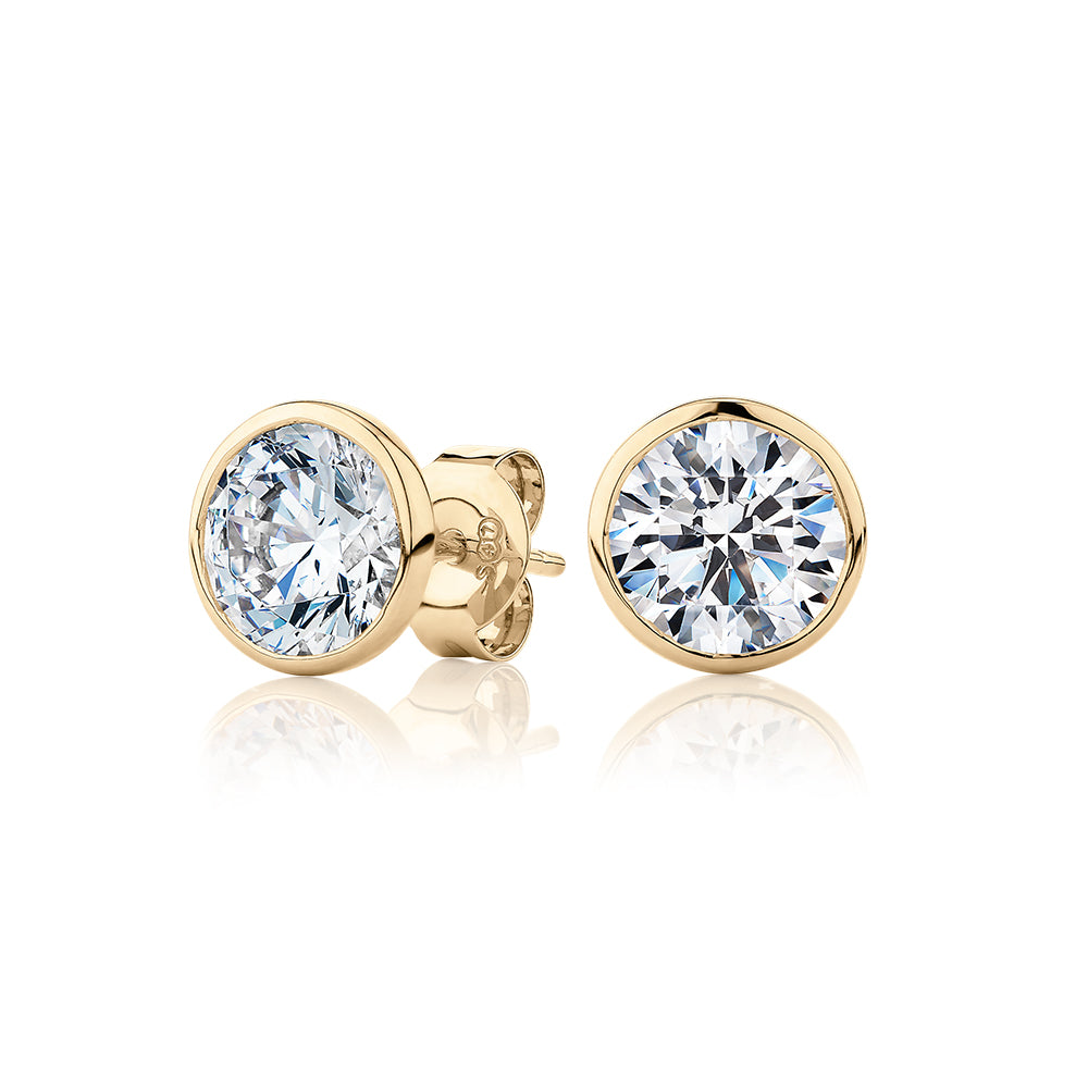 Round Brilliant stud earrings with 3 carats* of diamond simulants in 10 carat yellow gold