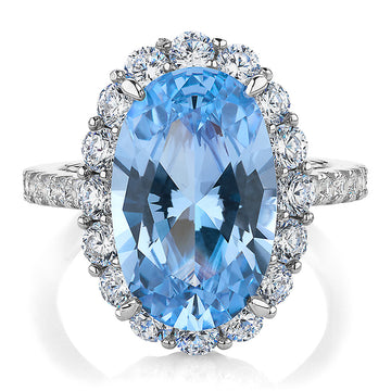 Dress ring with blue topaz simulant and 1.52 carats* of diamond simulants in sterling silver