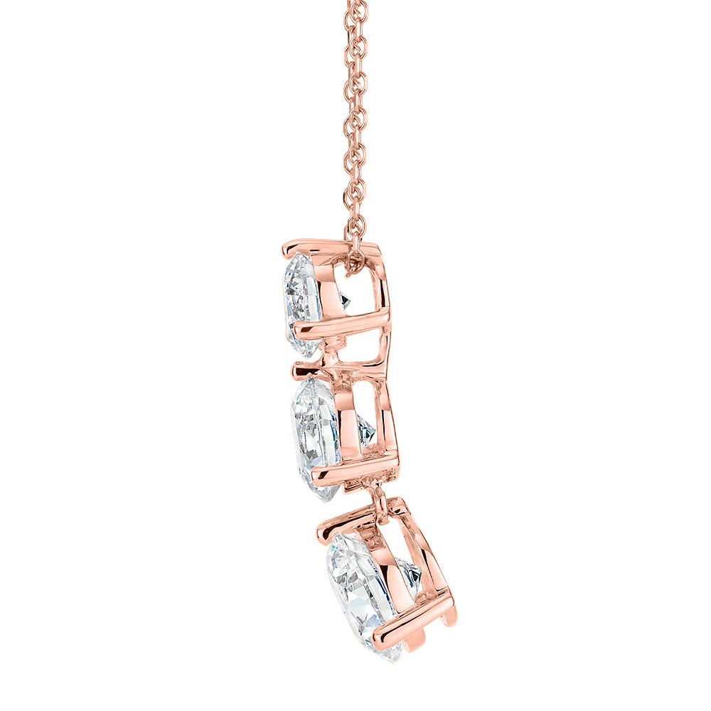 Three stone drop pendant with 2.33 carats* of diamond simulants in 10 carat rose gold