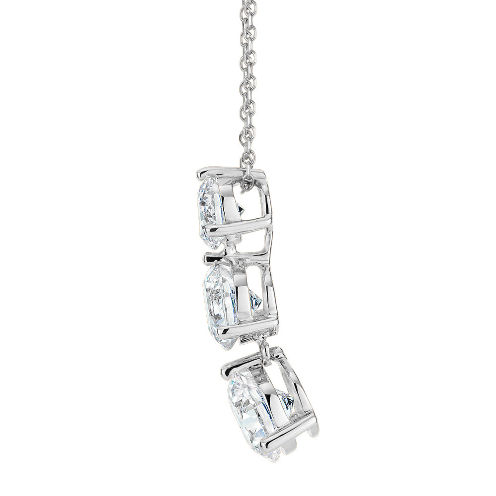 Three stone drop pendant with 2.33 carats* of diamond simulants in 10 carat white gold