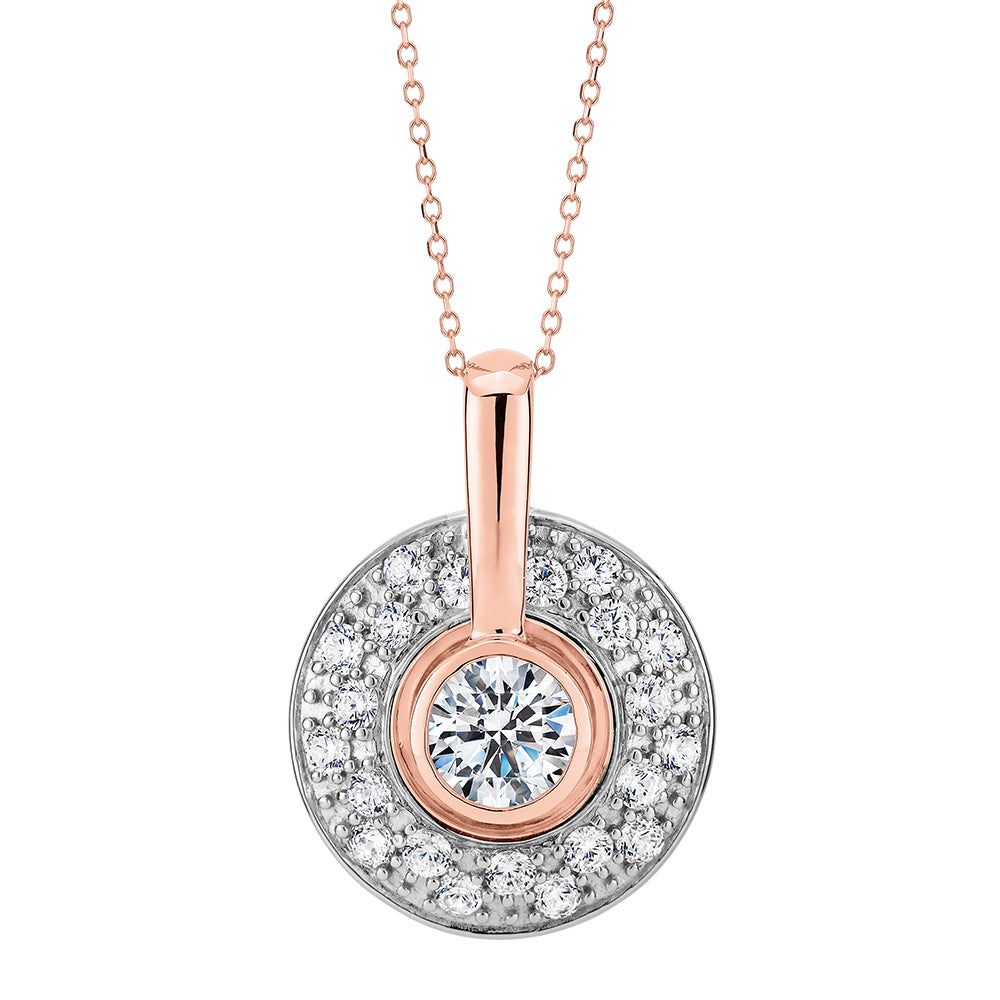 Halo pendant with 1.75 carats* of diamond simulants in 10 carat rose gold and sterling silver