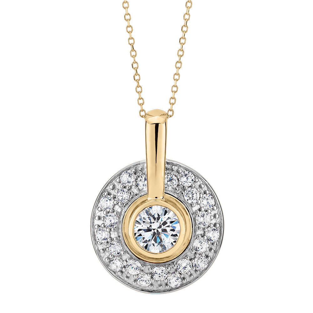 Halo pendant with 1.75 carats* of diamond simulants in 10 carat yellow gold and sterling silver