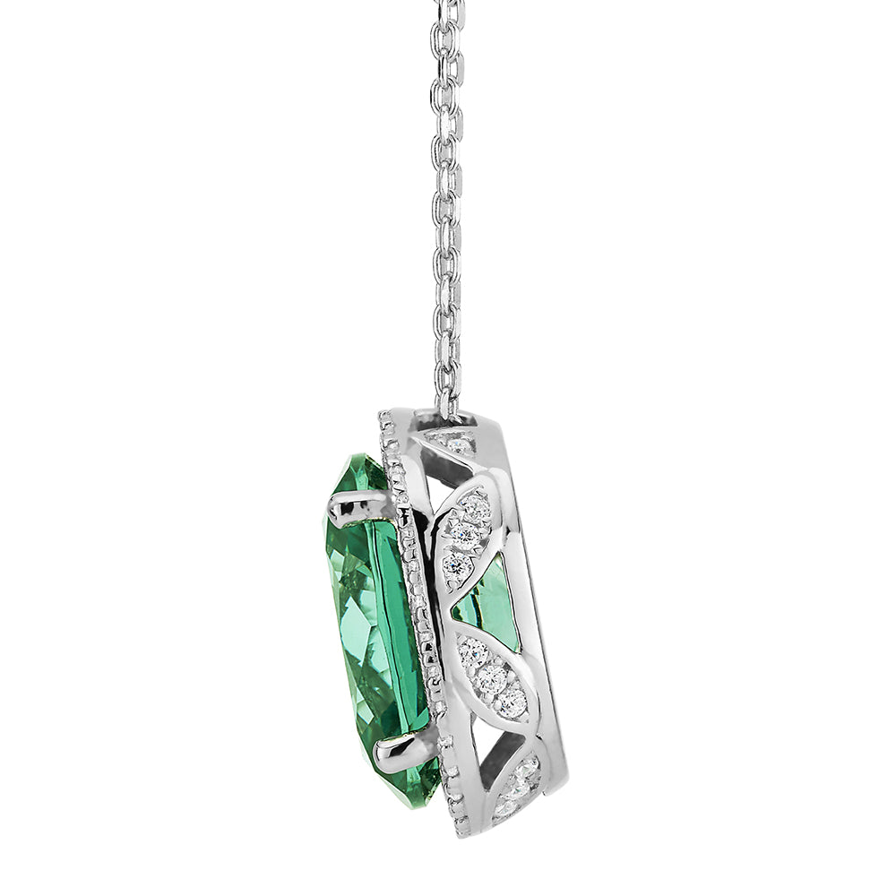 Halo necklace with ocean green simulant and 0.27 carats* of diamond simulants in sterling silver