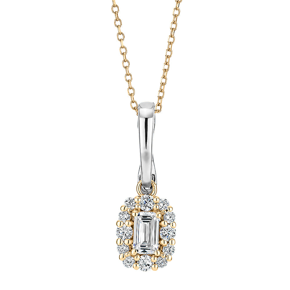 Fancy pendant with 0.53 carats* of diamond simulants in 10 carat yellow gold and sterling silver
