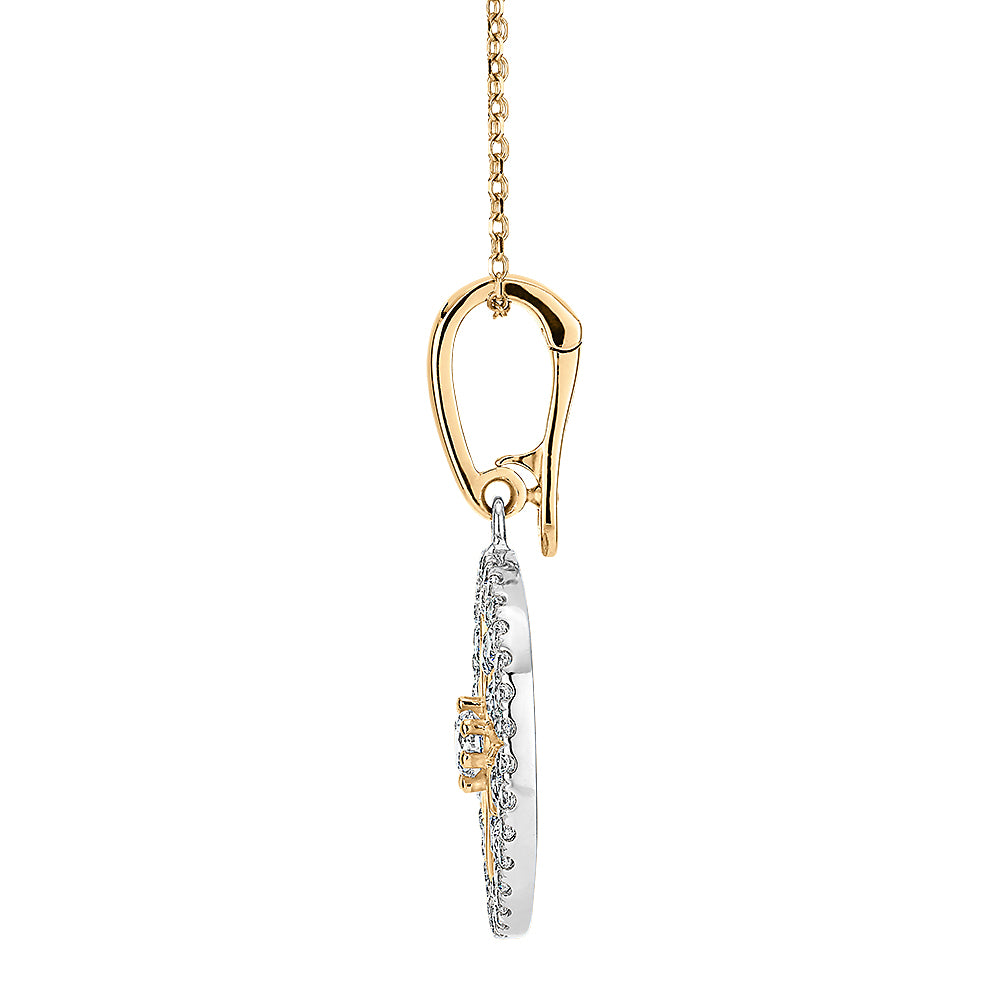 Fancy pendant with 0.95 carats* of diamond simulants in 10 carat yellow gold and sterling silver