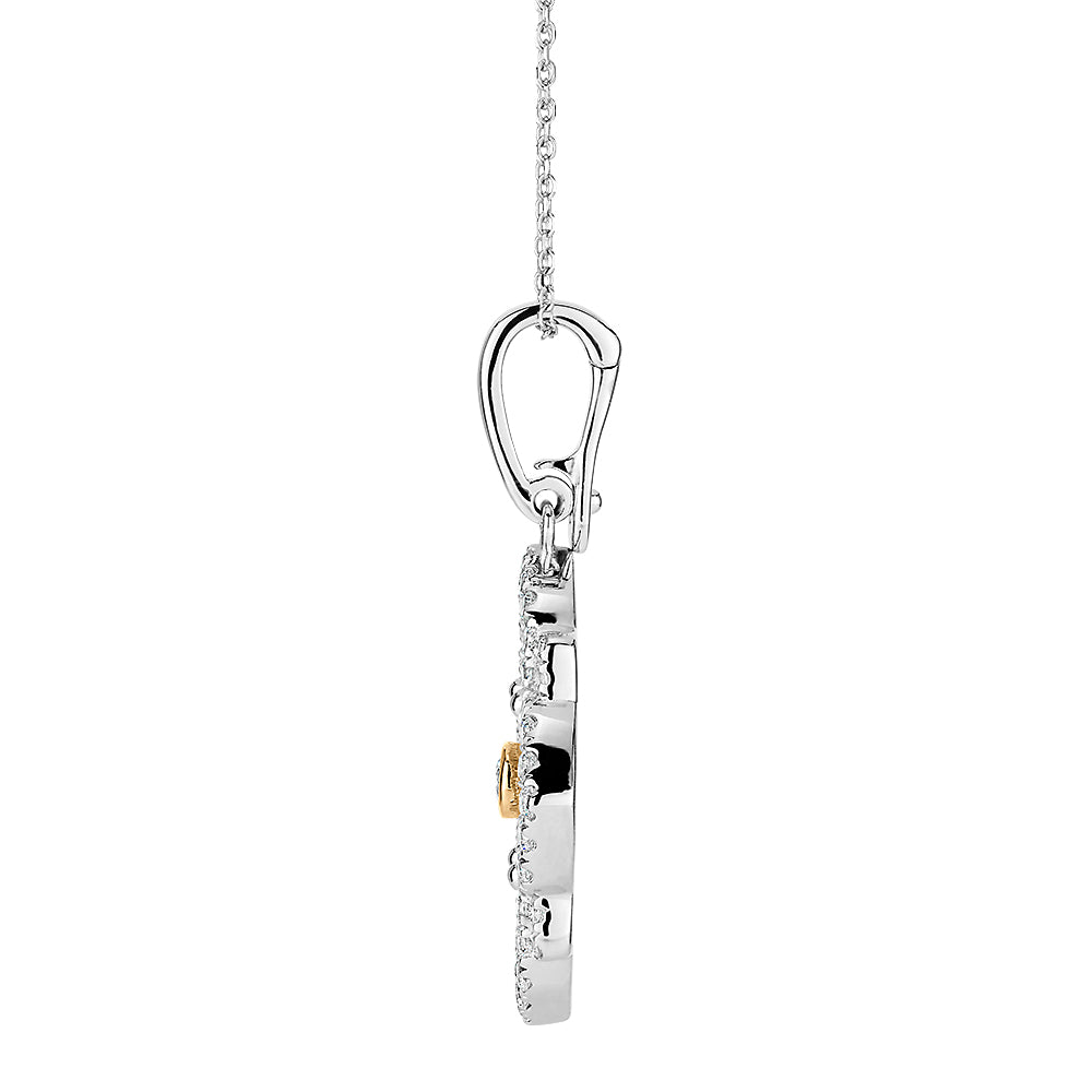 Fancy pendant with 0.67 carats* of diamond simulants in 10 carat yellow gold and sterling silver