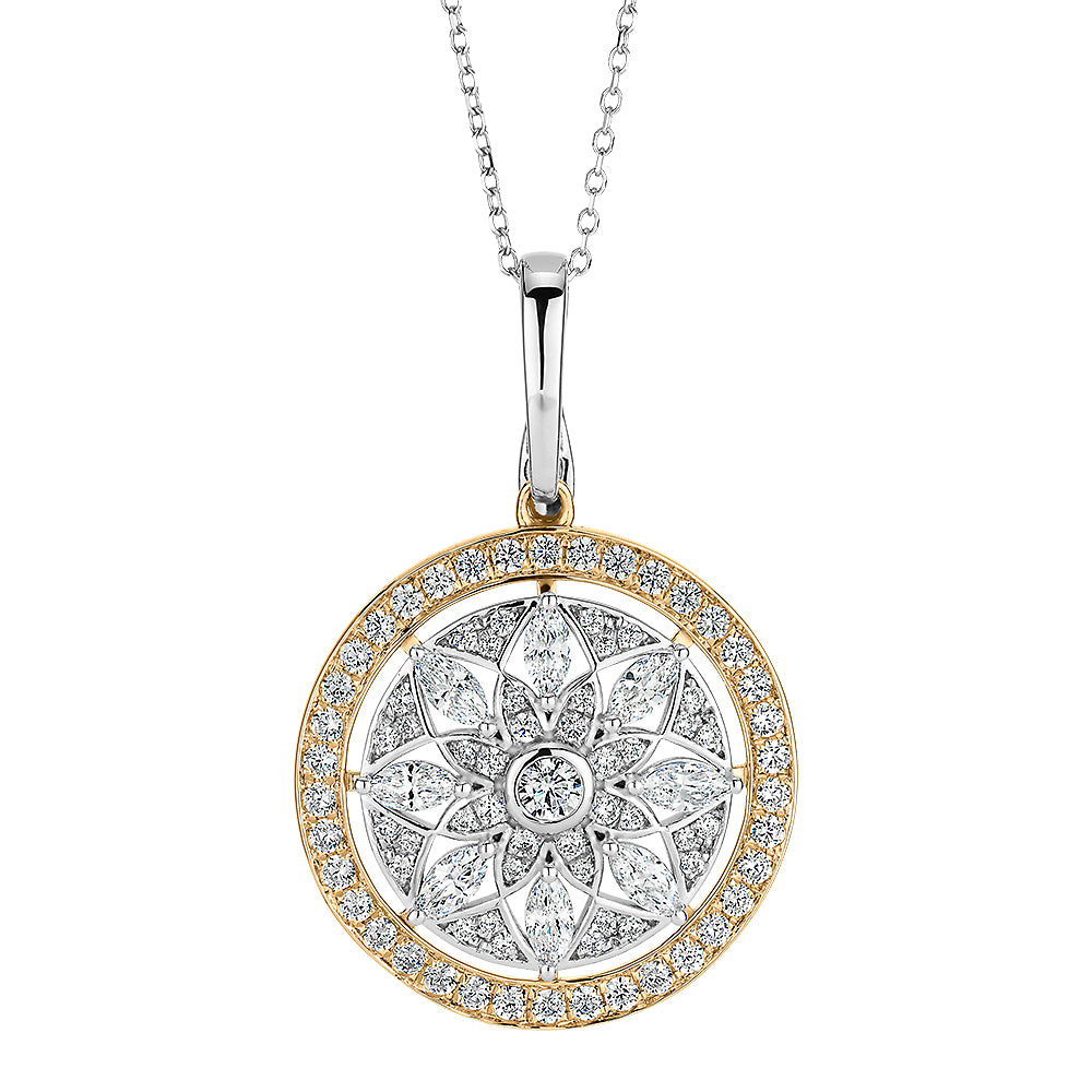 Fancy pendant with 1.43 carats* of diamond simulants in 10 carat yellow gold and sterling silver