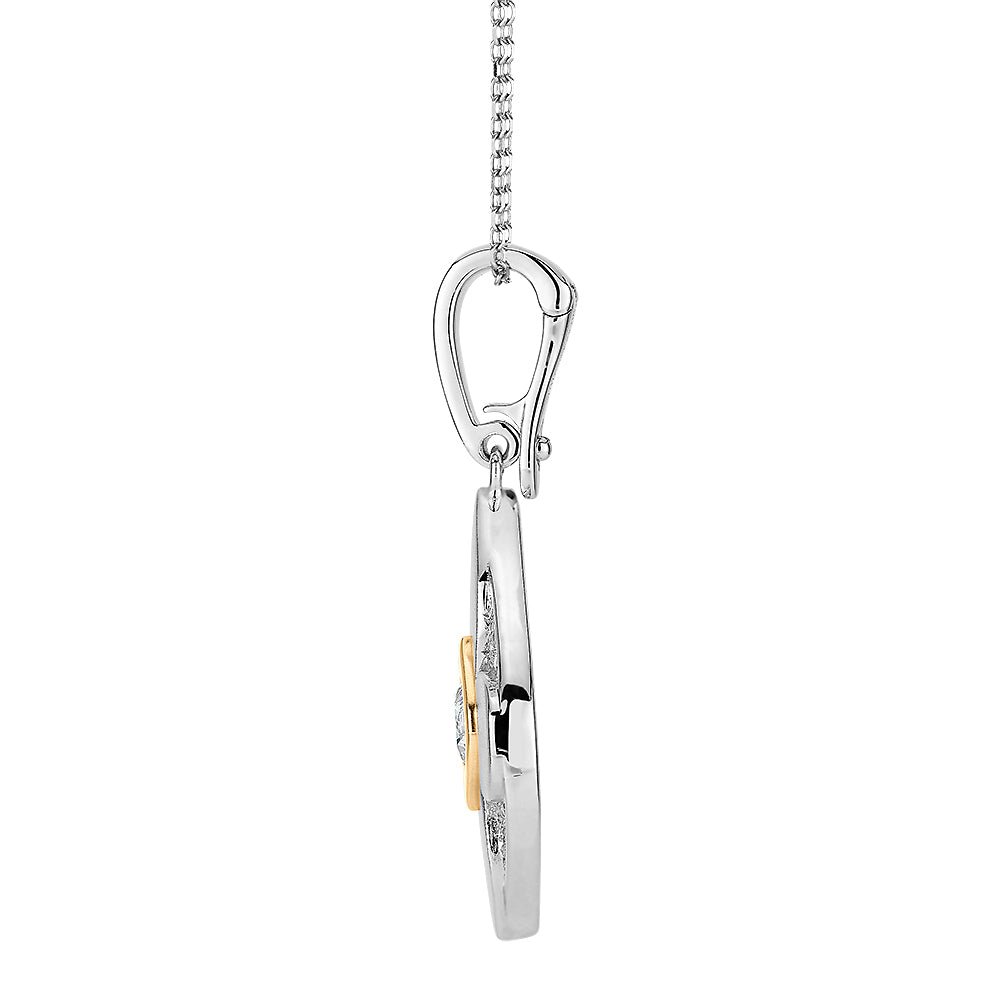 Fancy pendant with 0.47 carats* of diamond simulants in 10 carat yellow gold and sterling silver
