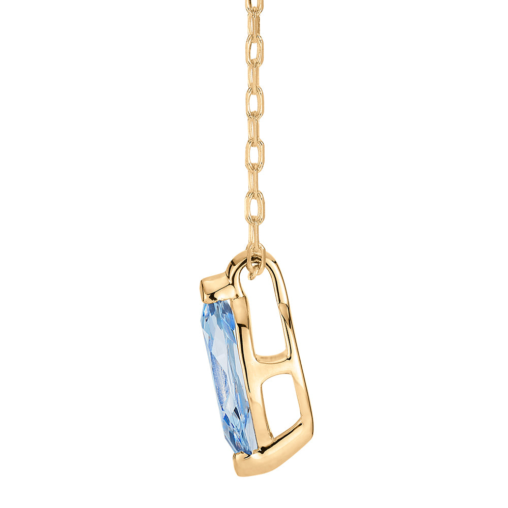Marquise solitaire pendant with aquamarine simulant in 10 carat yellow gold