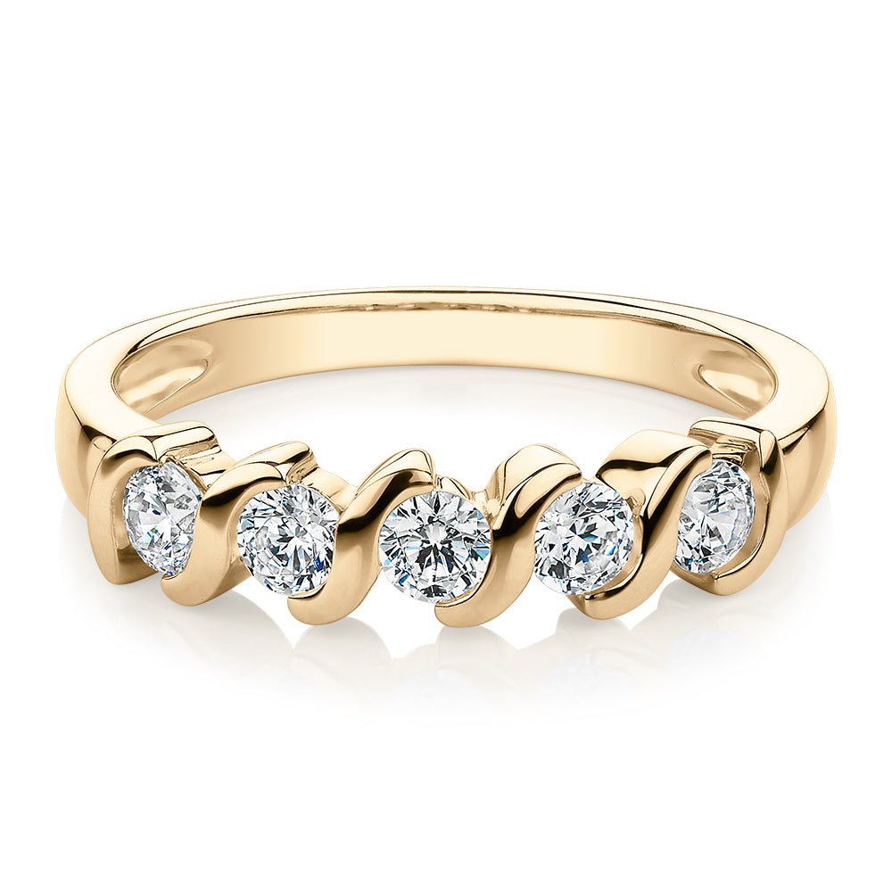 Wedding or eternity band with 0.55 carats* of diamond simulants in 10 carat yellow gold