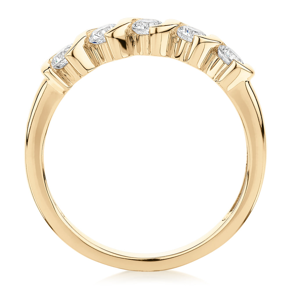Wedding or eternity band with 0.55 carats* of diamond simulants in 10 carat yellow gold