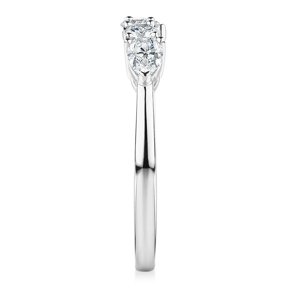 Curved wedding or eternity band with 0.83 carats* of diamond simulants in 14 carat white gold