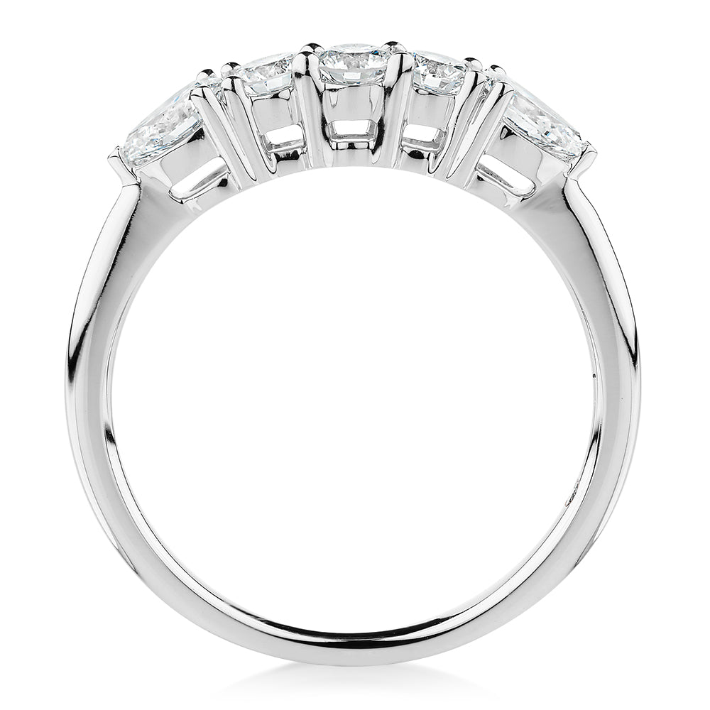 Curved wedding or eternity band with 0.83 carats* of diamond simulants in 14 carat white gold