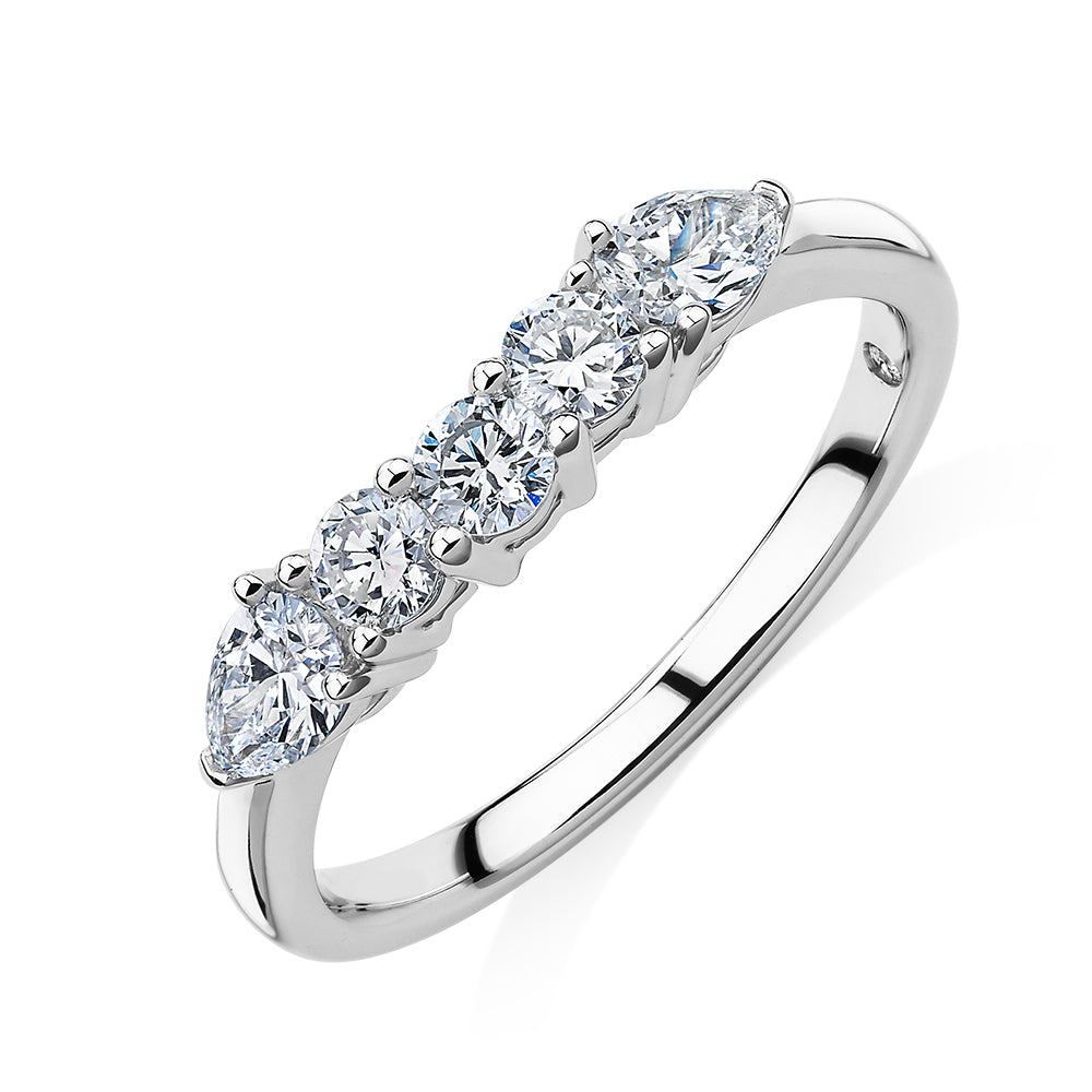 Curved wedding or eternity band with 0.83 carats* of diamond simulants in 14 carat white gold
