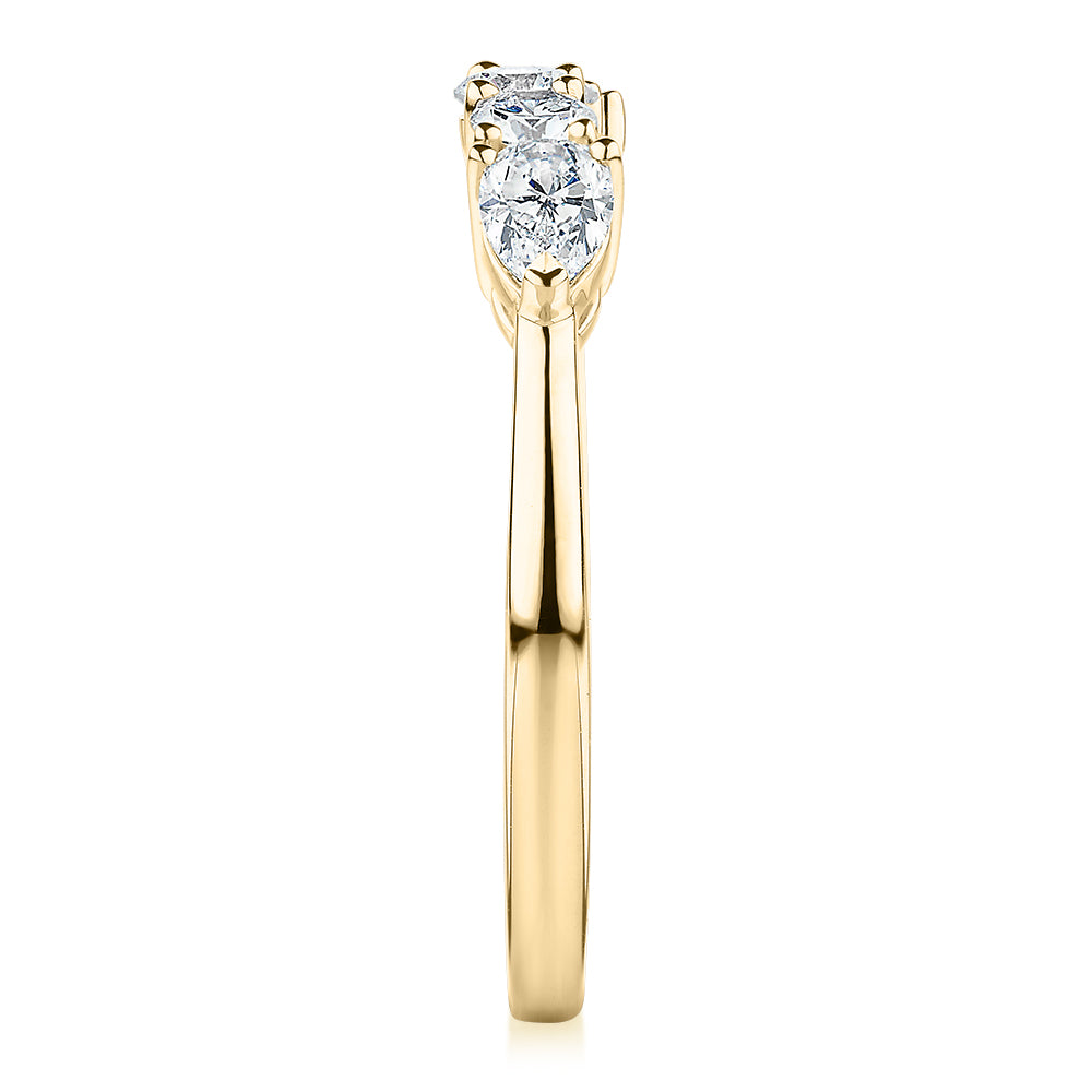 Curved wedding or eternity band with 0.83 carats* of diamond simulants in 14 carat yellow gold