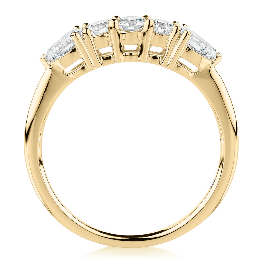 Curved wedding or eternity band with 0.83 carats* of diamond simulants in 14 carat yellow gold