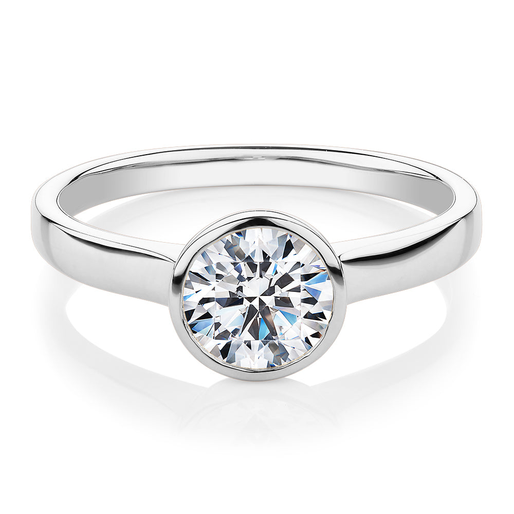Round Brilliant solitaire engagement ring with 1 carat* diamond simulant in 14 carat white gold