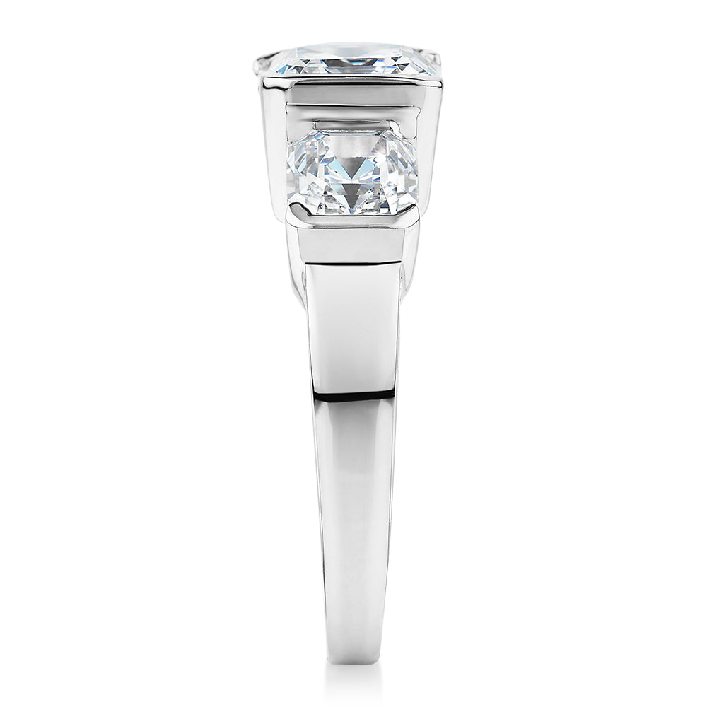 Three stone ring with 3.38 carats* of diamond simulants in 10 carat white gold
