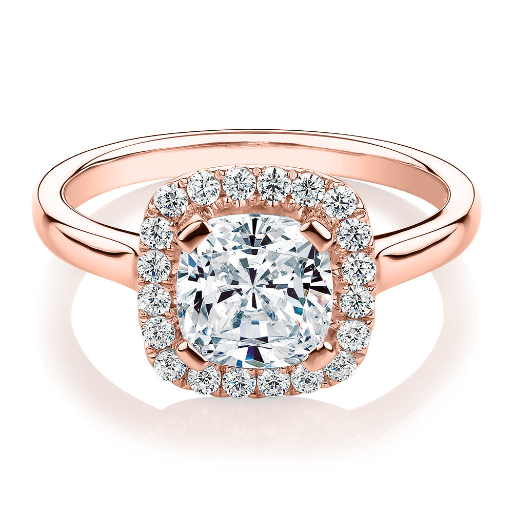 Cushion and Round Brilliant halo engagement ring with 1.58 carats* of diamond simulants in 10 carat rose gold