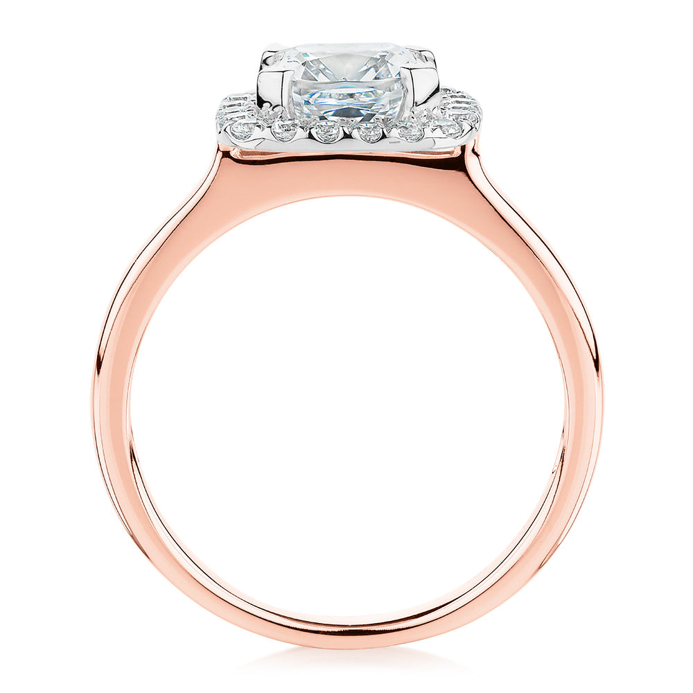 Cushion and Round Brilliant halo engagement ring with 1.58 carats* of diamond simulants in 10 carat rose and white gold